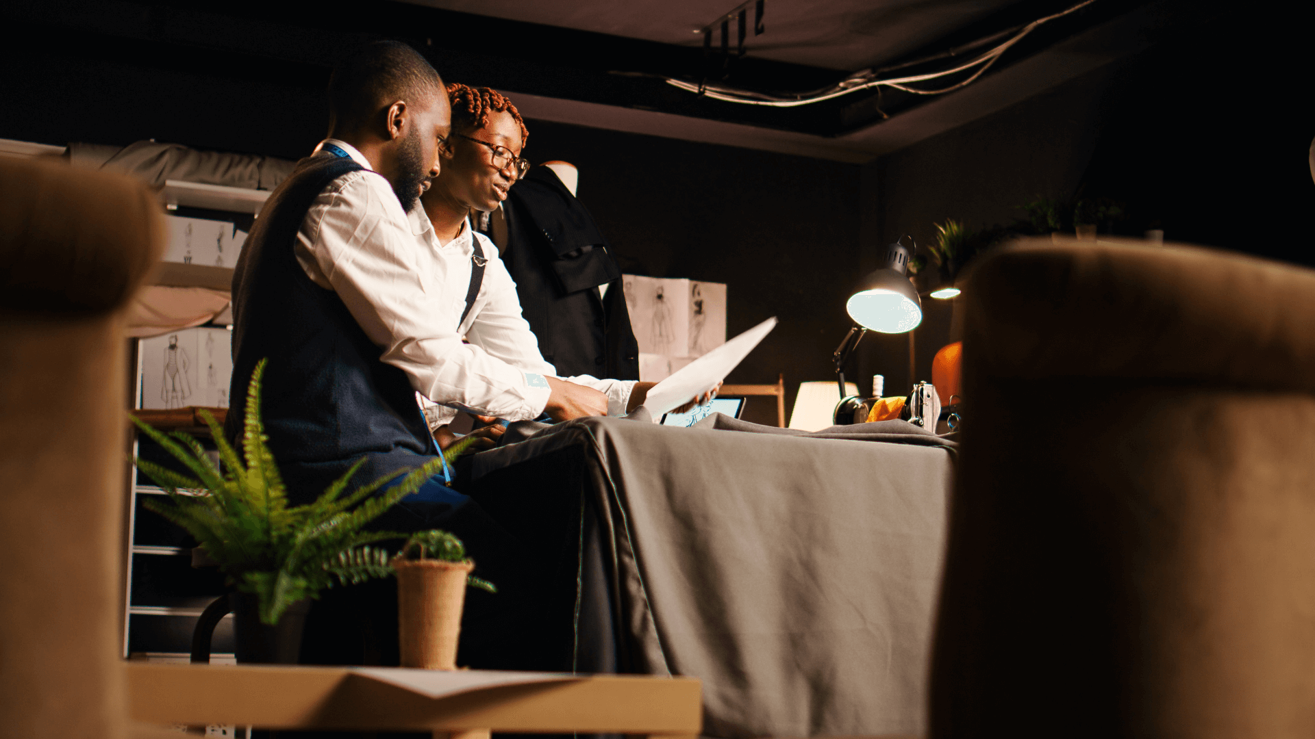 Two restaurant staff working.